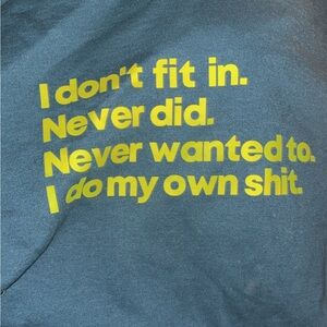 Dark teal hoodie with Neon writing